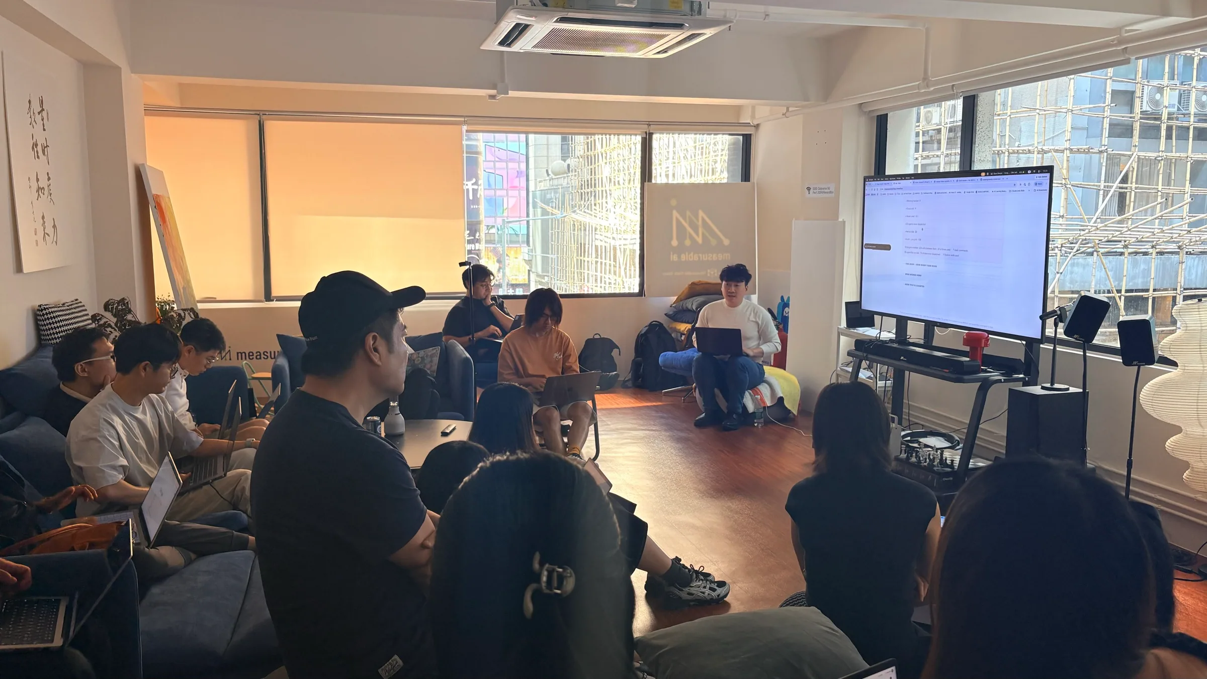 Participants gathered around their laptops during the Open Design Hong Kong workshop.