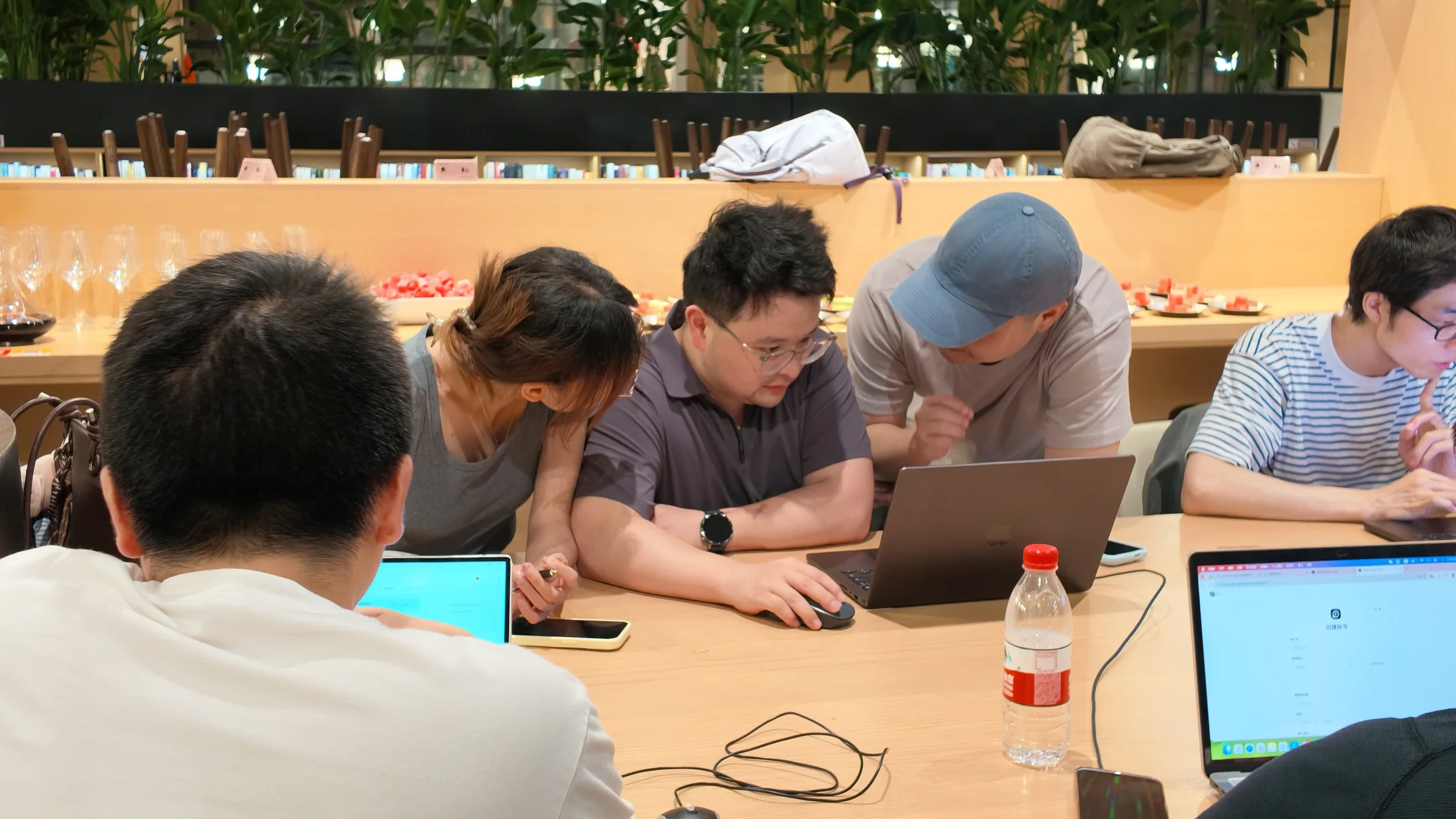 Participants comparing work and helping one another at the Open Design Shanghai workshop.